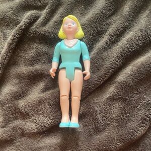 Blonde Doll Figure with Teal Outfit